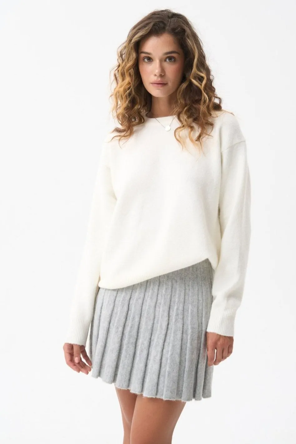 Wool sweater in color milk