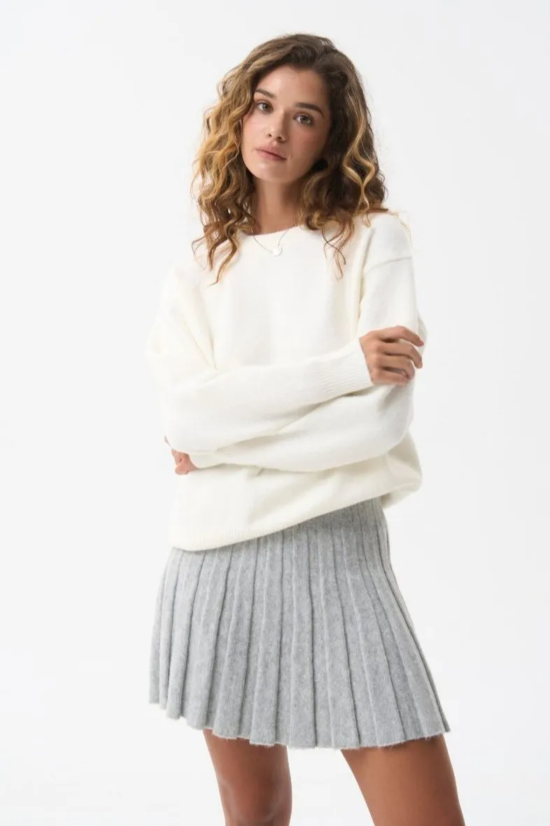 Wool sweater in color milk